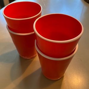 Anthropologie orange cups with white rim